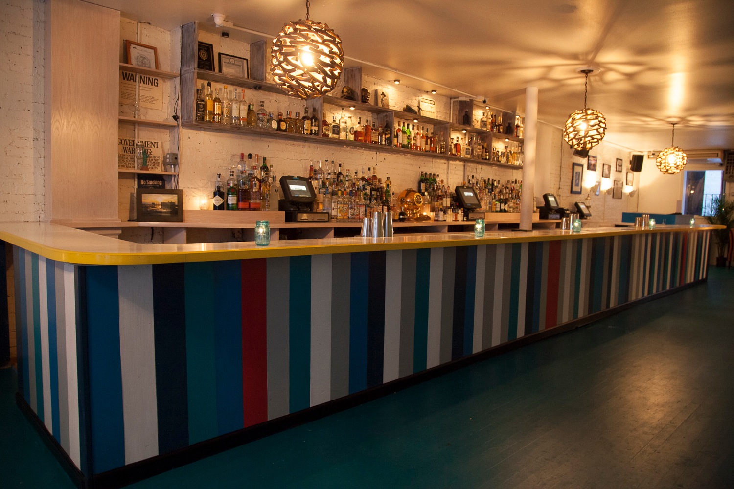 New York City’s Lazy Point evokes an urban beach house and boasts a tropically inspired cocktail list, as well as a raw bar, oysters and other upscale small plates–style dishes.
