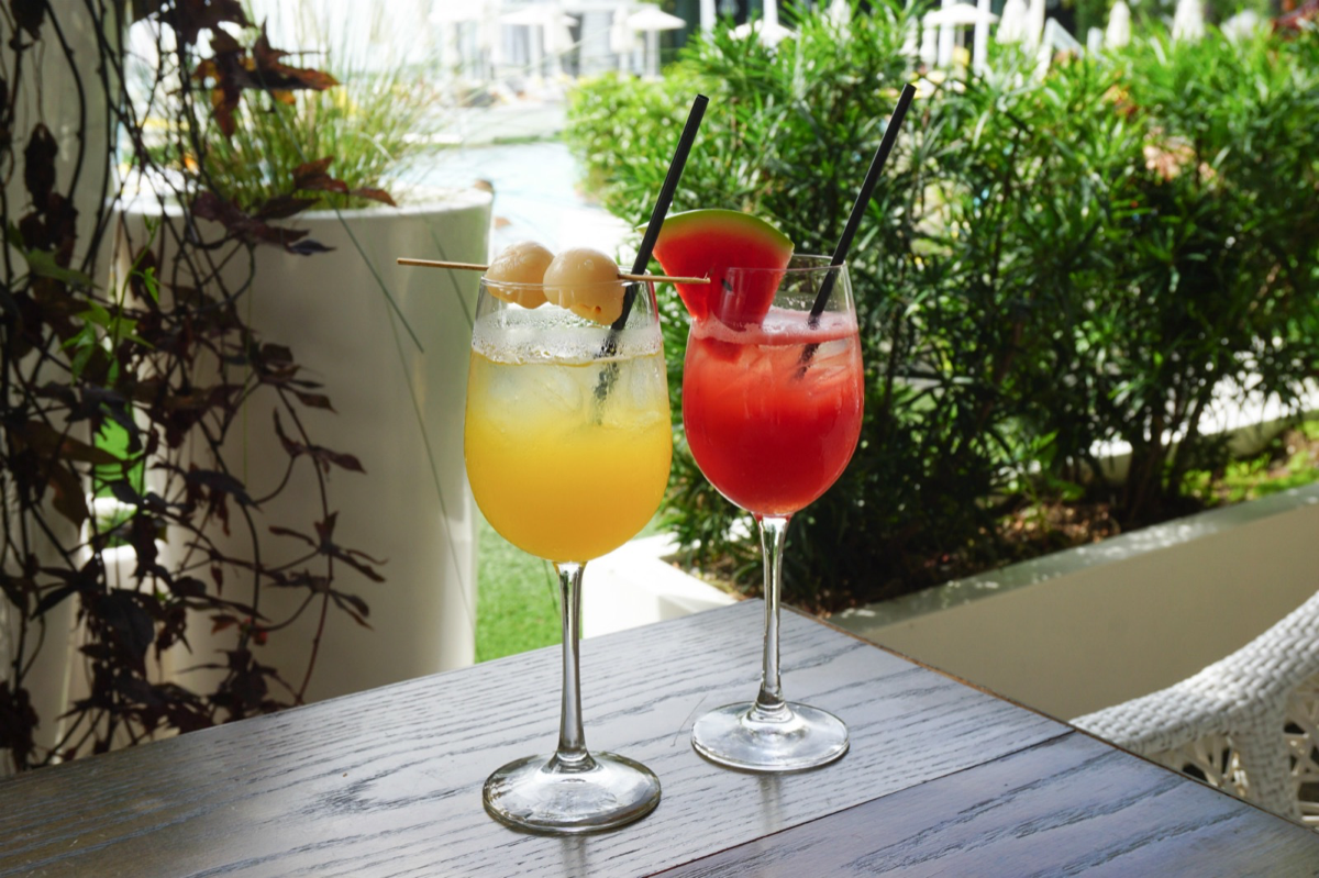 Many consumers are experimenting with classic wine cocktails like sangria. Rather than the traditional sparkling wine, the Lychee Passion Sangria (left) uses riesling and sake, while Watermelon Rose Sangria (right) uses rosé.