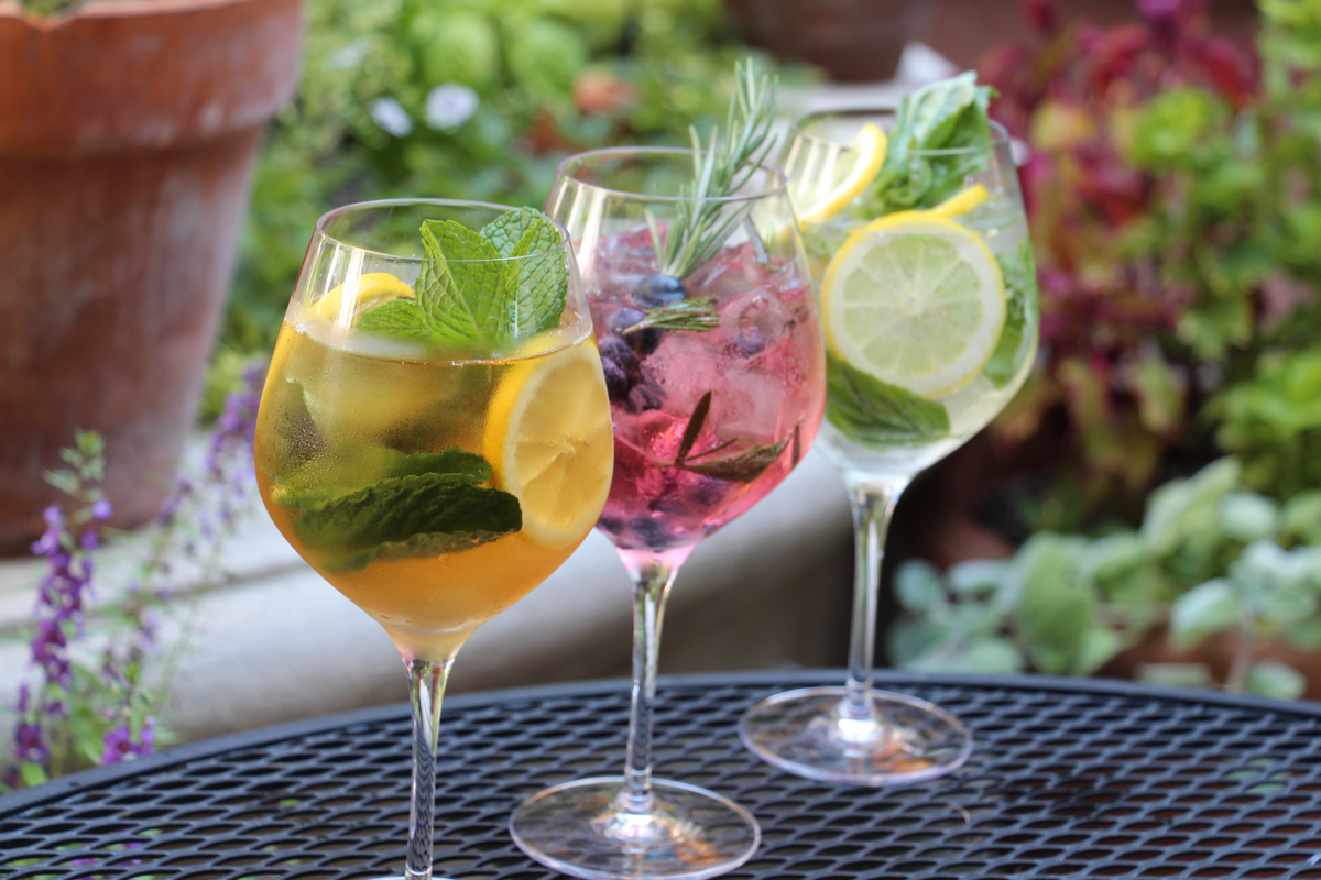 Spritzers like the Pimm and Proper (right), Blue Rose (center) and Jalapeño Basil (left) give consumers lower-alcohol options.