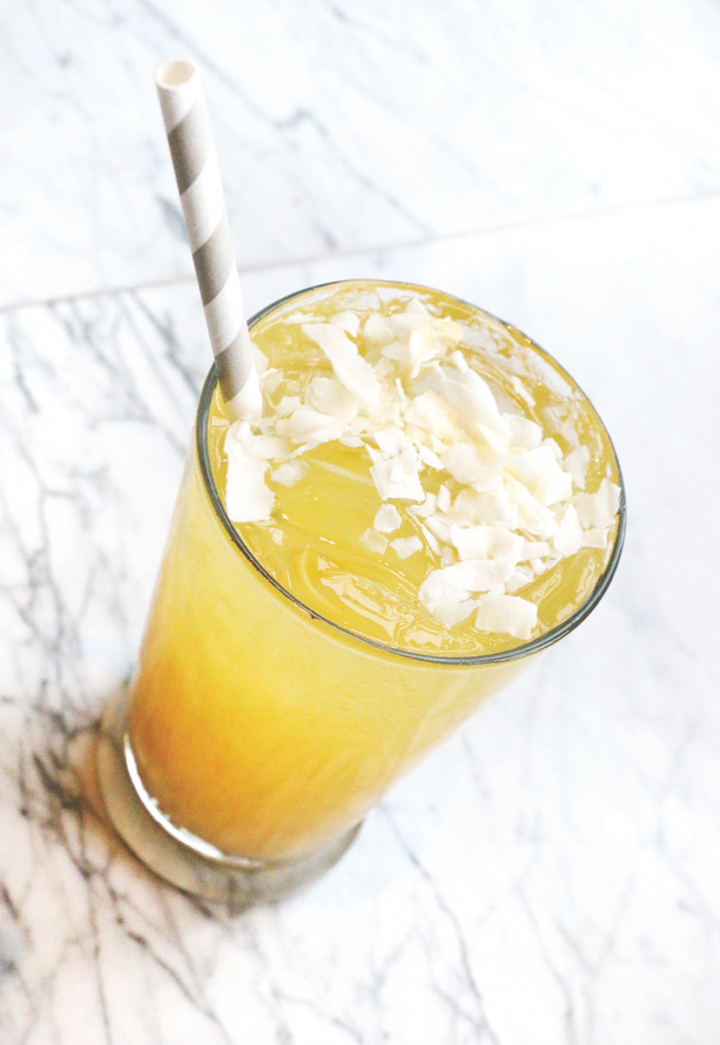 The Rx Painkiller at Remedy in Dallas mixes two types of rum with orange juice and the bar’s house-made banana-pineapple soda, topped with coconut flakes.