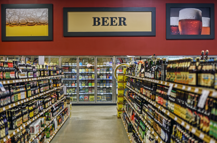 At Binny's Beverage Depot in Chicago (pictured), the cold box flow is arranged largely by price, with flavored malts, imports and craft beers following premiums and budget beers.