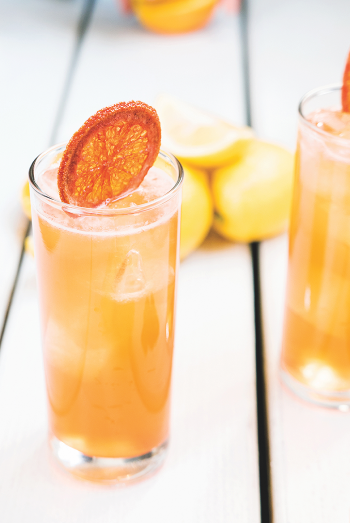 Bartaco's Oaxaca Spritz (pictured) blends mezcal, aperitif, and fresh guava and lemon juices.