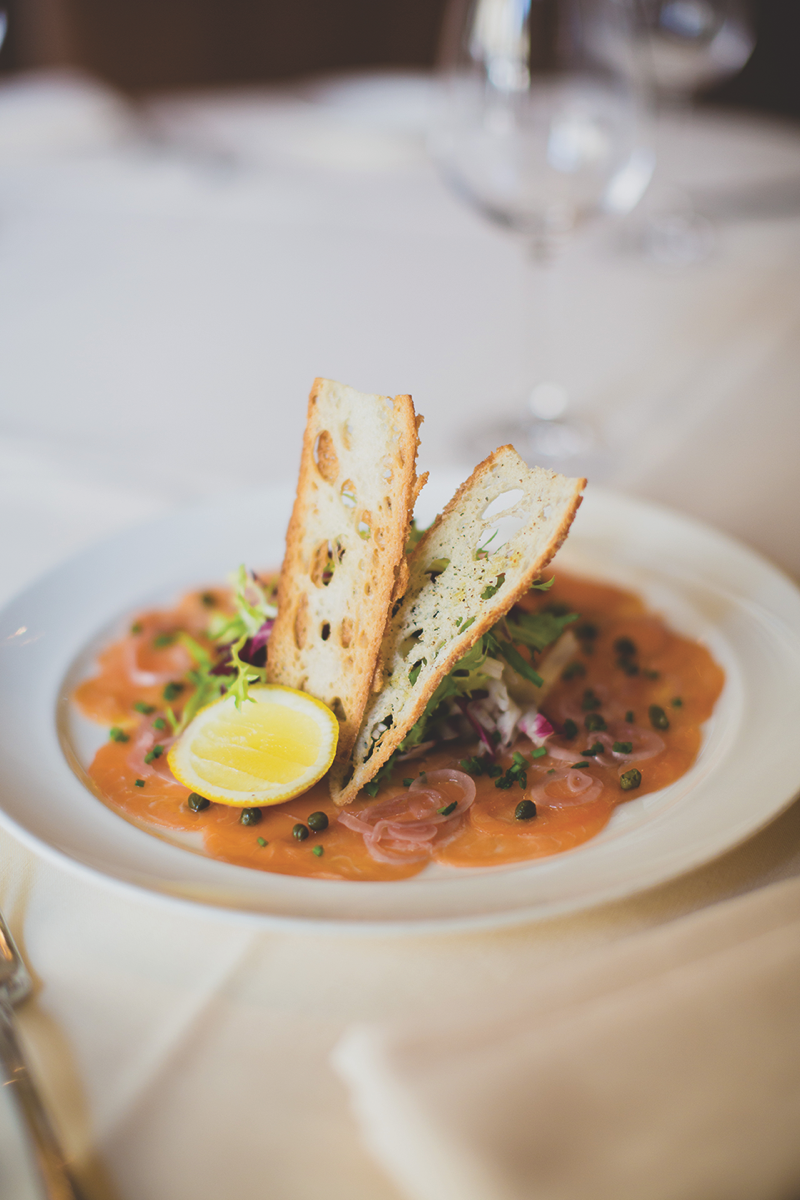In addition to owning Quattro Gastronomia (restaurant's salmon carpaccio pictured), KNR manages several on-premise venues within the W South Beach.