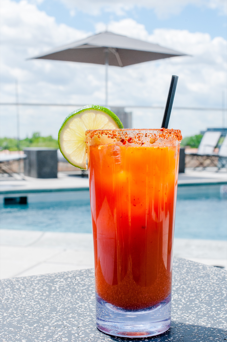 Atop The Robey in Chicago, the Cabana Club serves a Michelada, blending Tecate beer, lime juice, and Cholula Original and Valentina Salsa Picante Mexican hot sauces. The drink serves as a low-alcohol cocktail option.