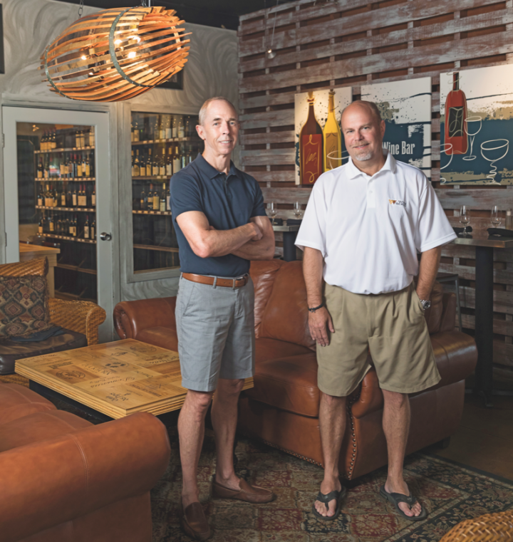 Wine World owner Chan Cox (left) and business manager Darren Moss (right) have successfully incorporated an on-premise ingredient into their retail stores.