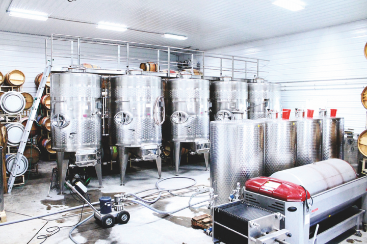 At Old Westminster (fermenters pictured), co-owner Drew Baker is bullish on canned wine's prospects.