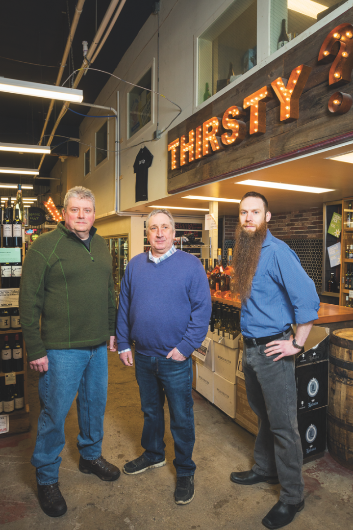 (From left): Beverage Warehouse minority owner George Bergin, general manager Todd Delbeck, and wine and beer manager Jason Dennis.