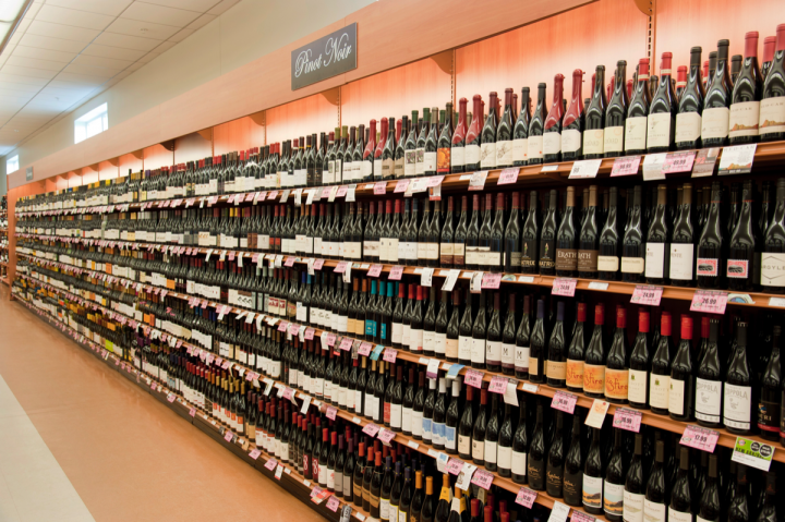 Franzia, Barefoot, and Woodbridge are among the top ten wine brands at the NHLC (wine shelving pictured at Nashua store).