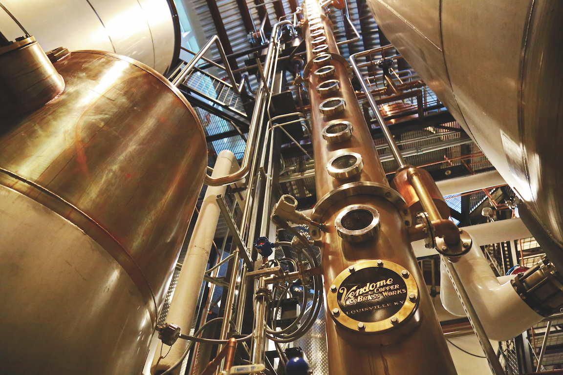 Colorado's natural resources, particularly its mountain water, are key to the state's craft distilleries. Breckenridge Distillery (stills pictured) in Breckenridge produces Bourbon, rum, vodka, and gin using Colorado water and local ingredients such as slope fruits.