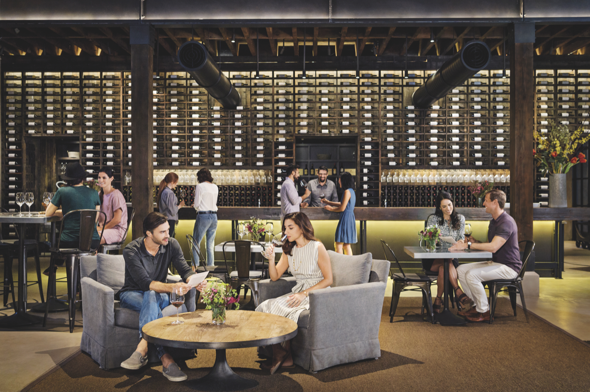Winery tasting rooms (Charles Krug Winery's tasting room pictured) serve as a personalized way for consumers to encounter a wine brand.