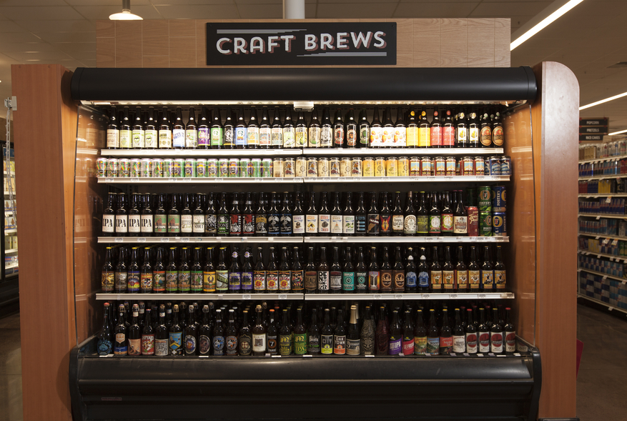 Imported and craft beer (cooler above) is gaining ground at Raley's, where top-sellers include Lagunitas IPA and Denmark's Munkebo Viking King porter.