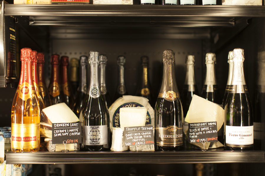 Raley's wine displays are evolving from branded displays to varietal executions, and the chain is cross-merchandising wine outside of beverage departments as well (wine and cheese display pictured).