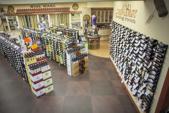 A member of the board of directors of the Massachusetts Package Store Association, Ryan Maloney of Julio's Liquors (interior pictured) in Westborough, says that eliminating the cap of beer and wine licenses would give retailers like Cumberland Farms an unfair advantage in the state.