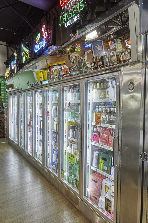 Jensen’s stocks about 6,500 beer SKUs (coolers pictured), which comprise 10% of total sales. While many major domestic brands are struggling, Cruz says that local craft offerings are still going strong.