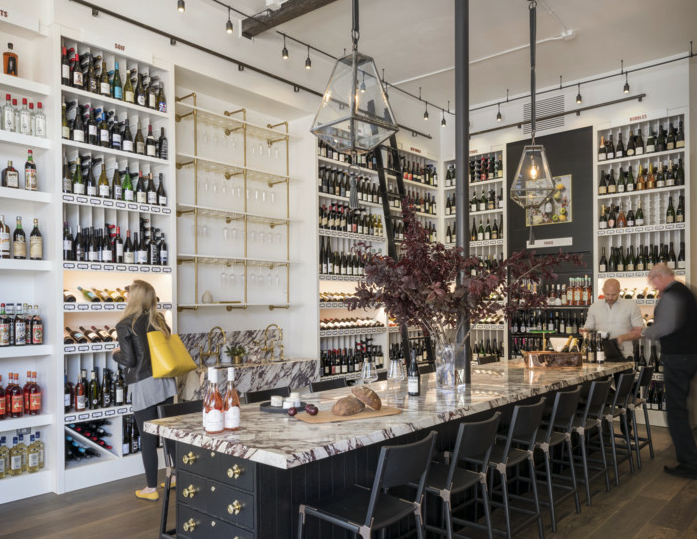 Both Verve Wine stores have a communal table—marble in San Francisco (pictured) and wood in New York—to evoke a sense of hospitality and community.