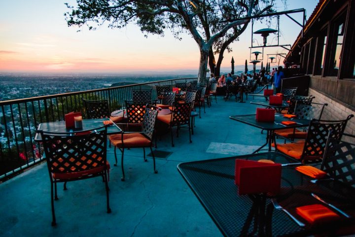 Each concept in the Specialty Restaurant Corp. portfolio features bustling bars, outdoor patios with scenic views (Orange Hill restaurant pictured).