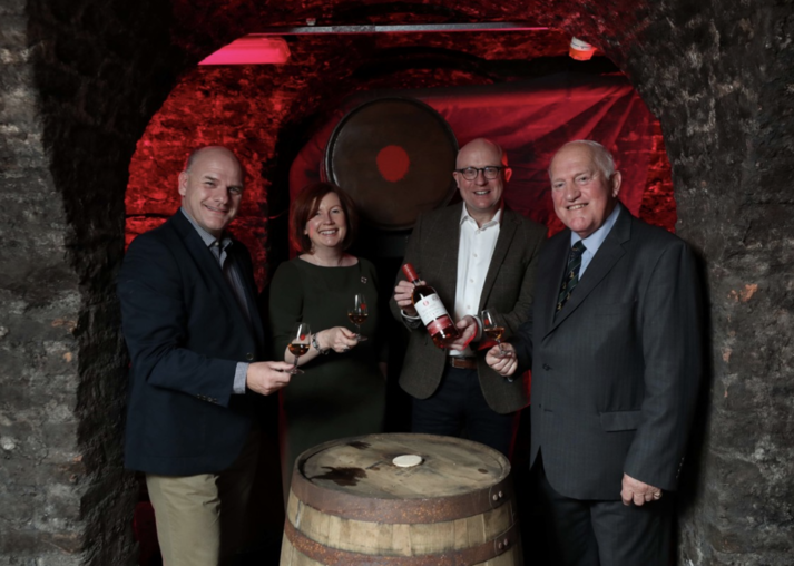 from left to right: Seventh-generation Mitchell & Son family member Robert Mitchell, Irish Distillers archivist Carol Quinn, Irish Distillers head of maturation Kevin O’Gorman, and sixth-generation leader and current Mitchell & Son managing director Jonathan Mitchell.