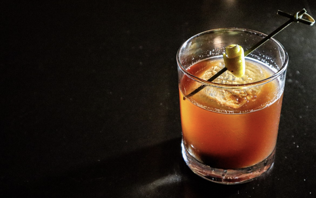 The Honey Do Right cocktail (pictured) from Gracias Madre in Newport Beach comprises Monkey 47 gin, house-made honey basil syrup, fresh lemon juice, and a Meletti fernet float. 