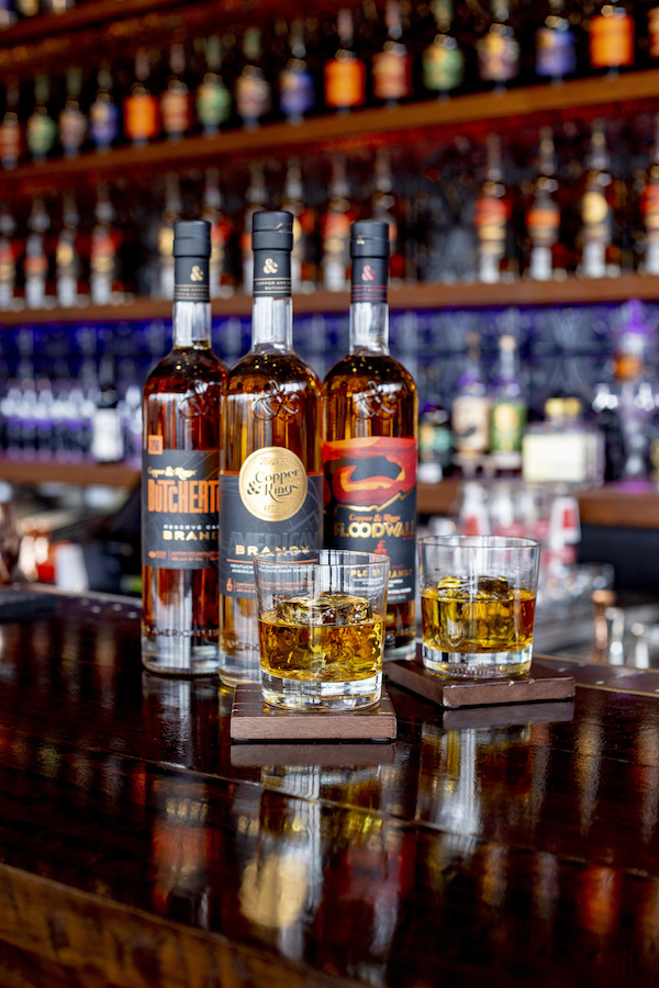 Copper & Kings’ American brandy offerings (selected bottles pictured) include special releases made in partnership with other distilleries, like Chicago’s F.E.W. Spirits.