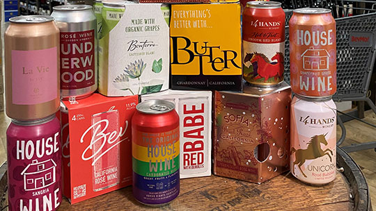 As canned wine (BevMo selection pictured) grows more popular, established brands like Underwood and House Wine are being joined by newcomers like Anheuser-Busch InBev-owned Babe wine brand.