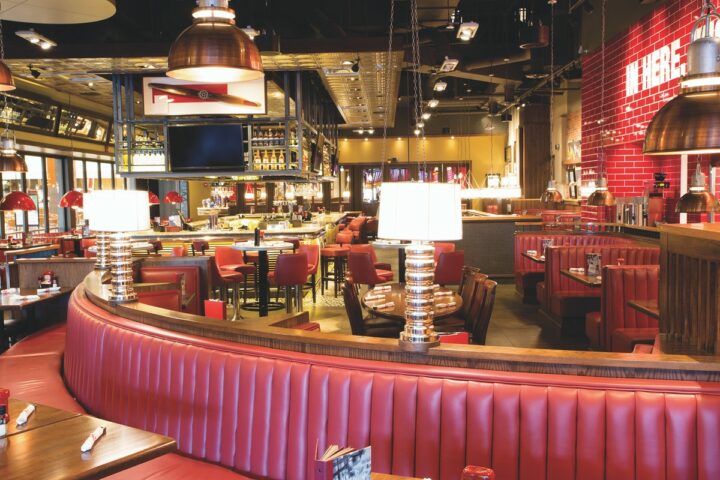 Beer is the second most popular drinks category at the TGI Fridays chain (White Plains, New York interior top). Each bar usually has 15 tap handles, with half mandated at the corporate level and half dedicated to local favorites.