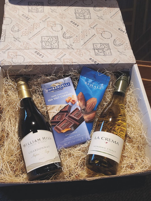 The Last Hotel expects to continue its wine takeout program (white wine box pictured), at-home boxes, and cocktail class and overnight stay package even after the pandemic is over. 