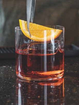 At Olivia in Denver, the Pumpkin Spiced Pumpkin Seed-Infused Rye Boulevardier (top) showcases the fall staple.