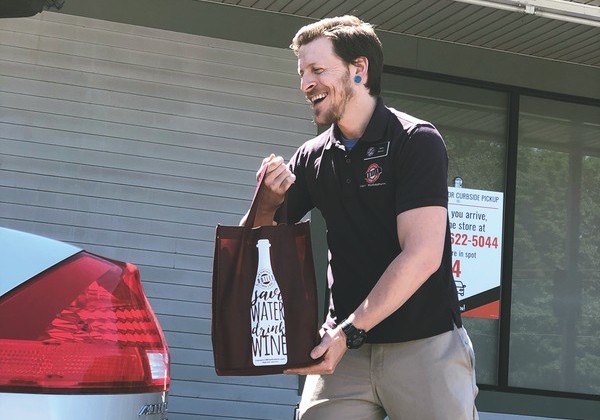 At New Hampshire Wine & Liquor Outlets, curbside orders (pictured) are available the next business day after ordering. In-store pickups, however, are available in as little as 90 minutes upon ordering. 