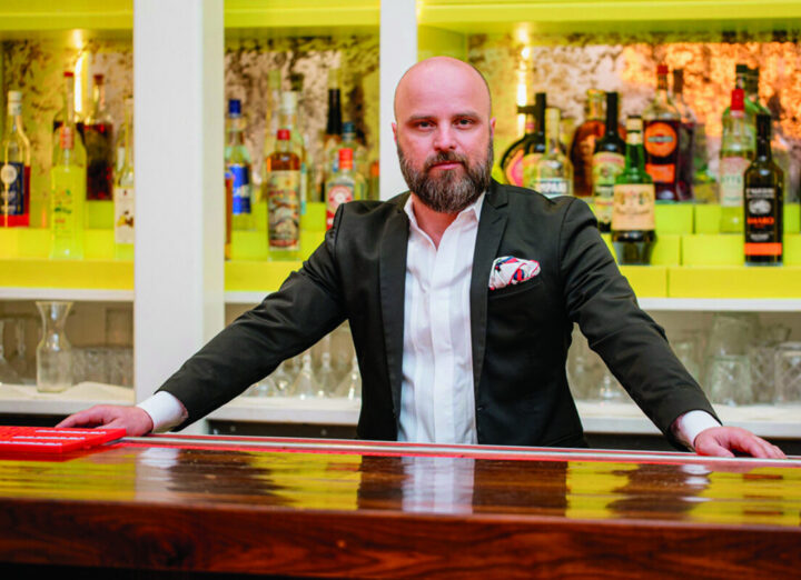 Aaron Thompson (pictured), cofounder and co-owner of Brother Wolf in Knoxville, Tennessee, says the bar industry is often stable during economic downturns because people crave a social atmosphere, even when times are tough.