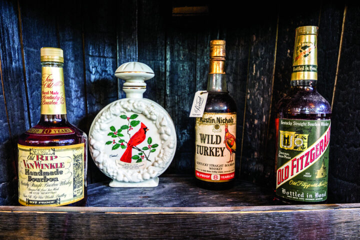 Many Kentucky bar and store owners (Revival Vintage Spirits & Bottle Shop bottles pictured) say the Vintage Spirits Law has helped the state’s economy, as it increases tourism along the Bourbon Trail and attracts whiskey aficionados who know they’ll find rare products that are otherwise unavailable.