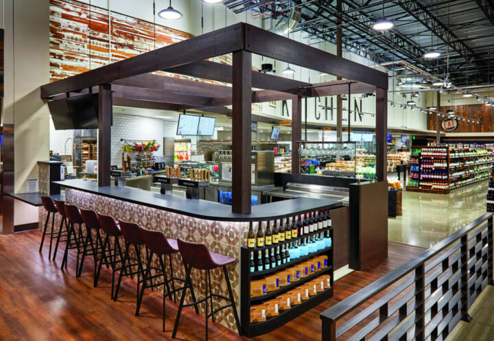 Raley’s entices customers to shop in the beverage alcohol section by holding tastings at in-store bar spaces (pictured) and by showcasing beverage products with other merchandise, including cross-category tie-ins.