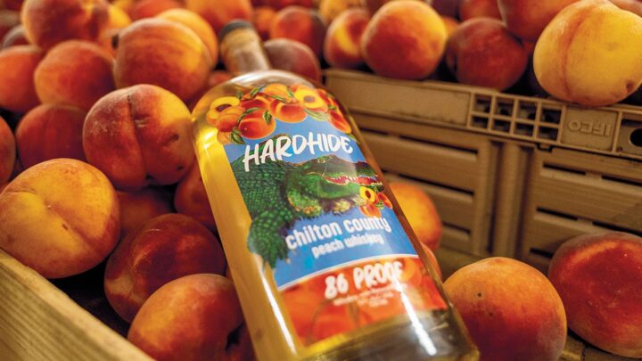 With the saturation of the flavored market, many producers are focused on natural ingredients to entice consumers. Hardhide Chilton County Peach whiskey (pictured) partners with Durbin Family Farms in Alabama for its peaches.