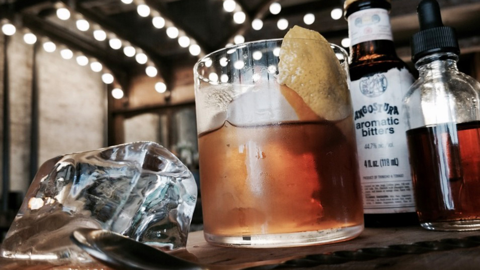 Glass of bourbon over smoked ice cubes garnished with smoked oranges. It's  1700 somewhere : r/Traeger