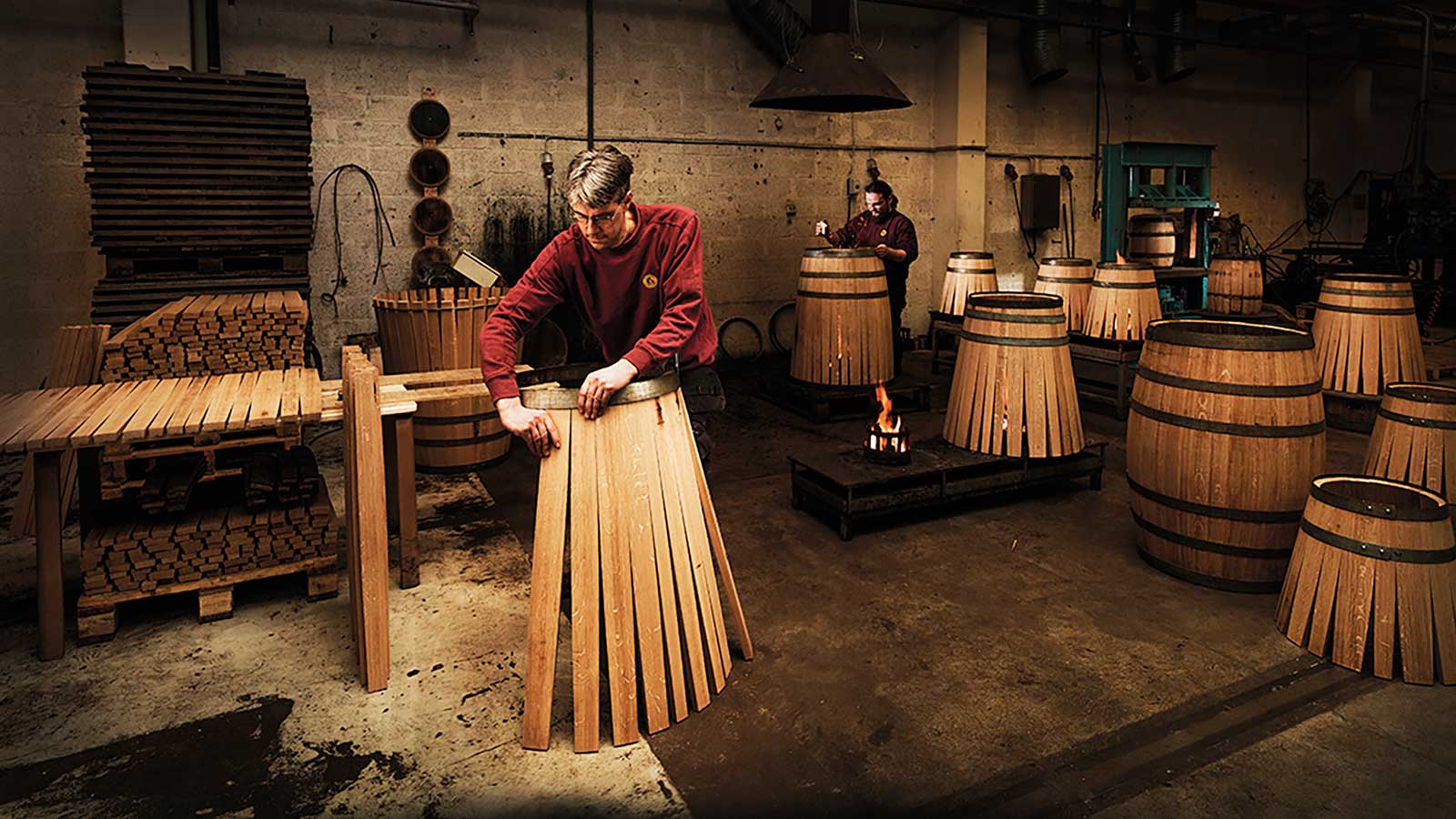 Swedish master cooper Johan Thorslund constructs a whisky barrel.