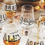 Written names on Glencarin glasses at a group tasting.