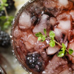 A blackberry and whiskey cocktail.