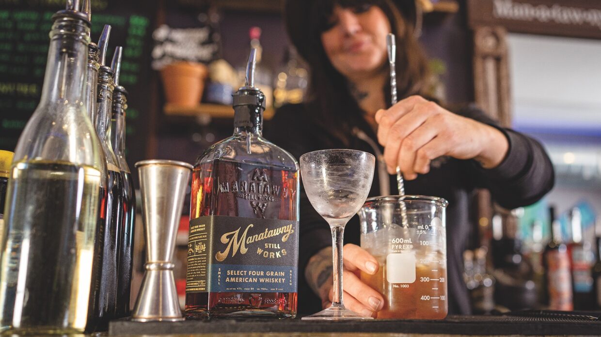 Bartender stirring a drink